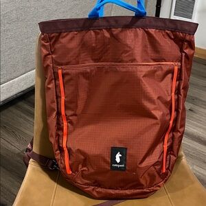 Cotopaxi Reddish Brown Backpack with Blue Handle